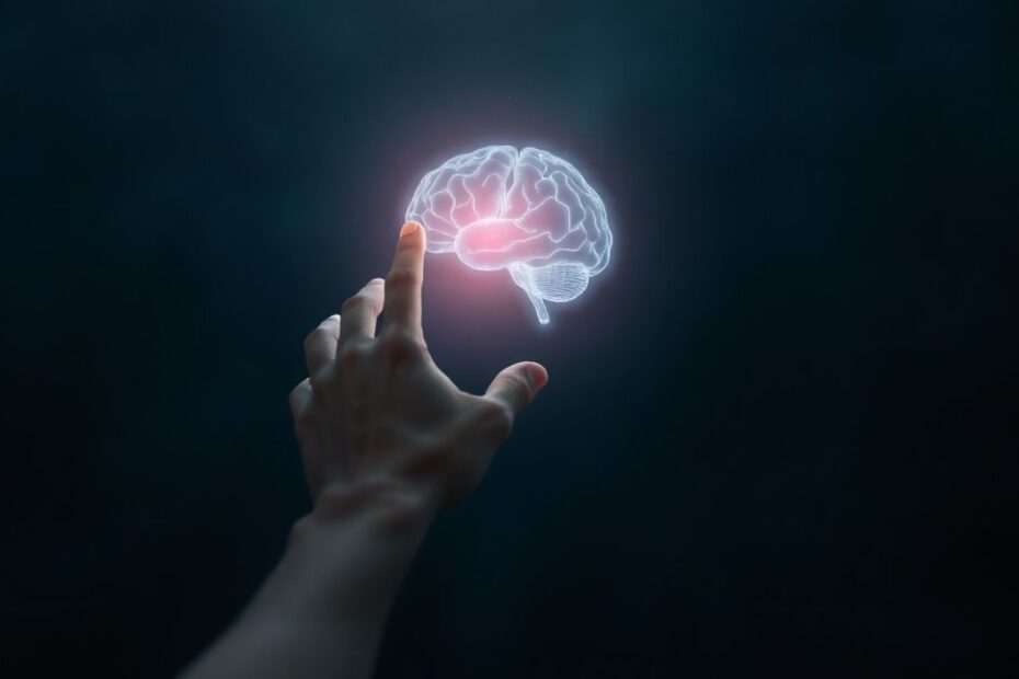 Human hand touches glowing digital brain in cosmic background.